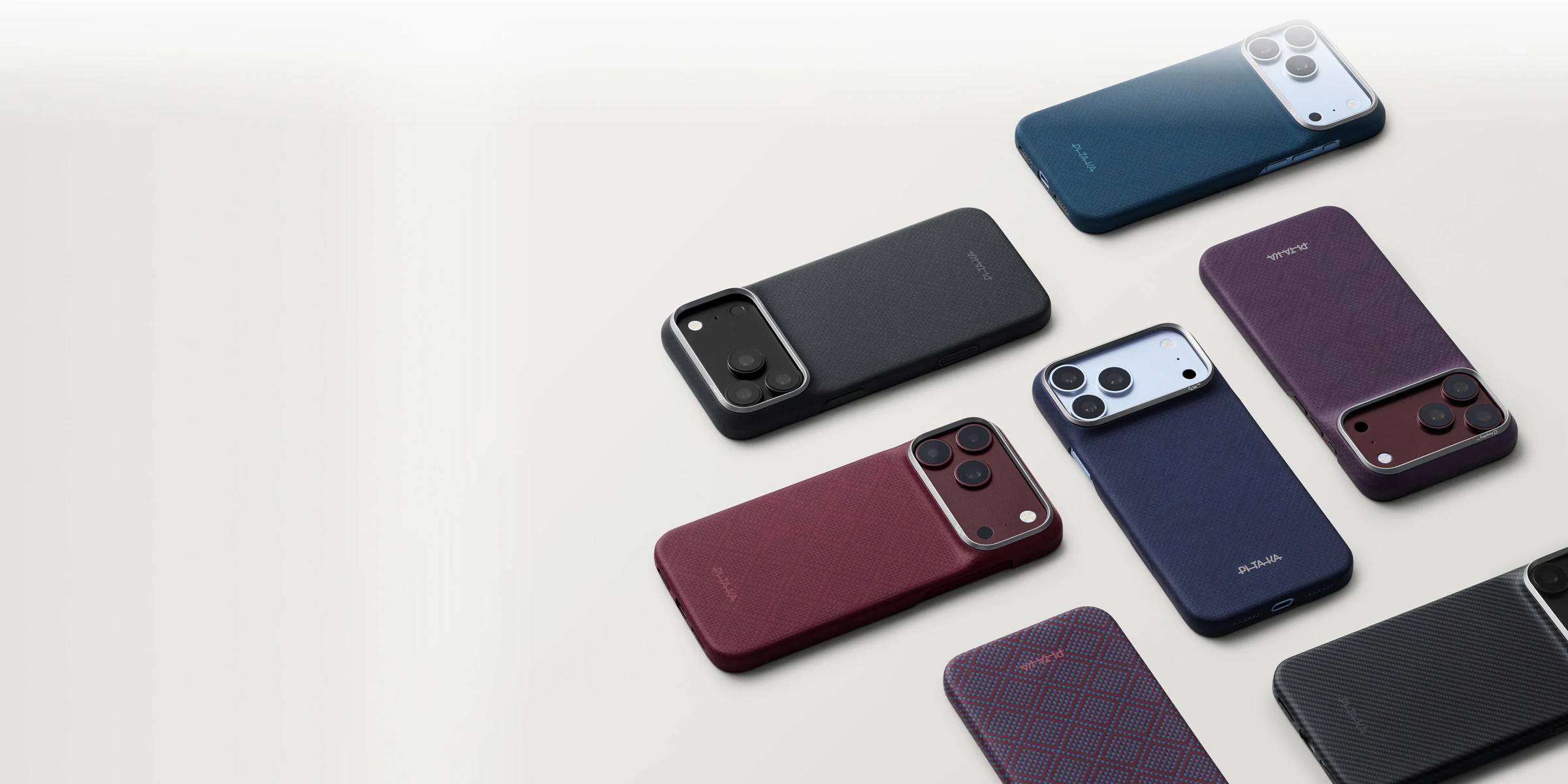 多款顏色的 PITAKA iPhone 18 Pro 芳綸纖維手機殼平放排列